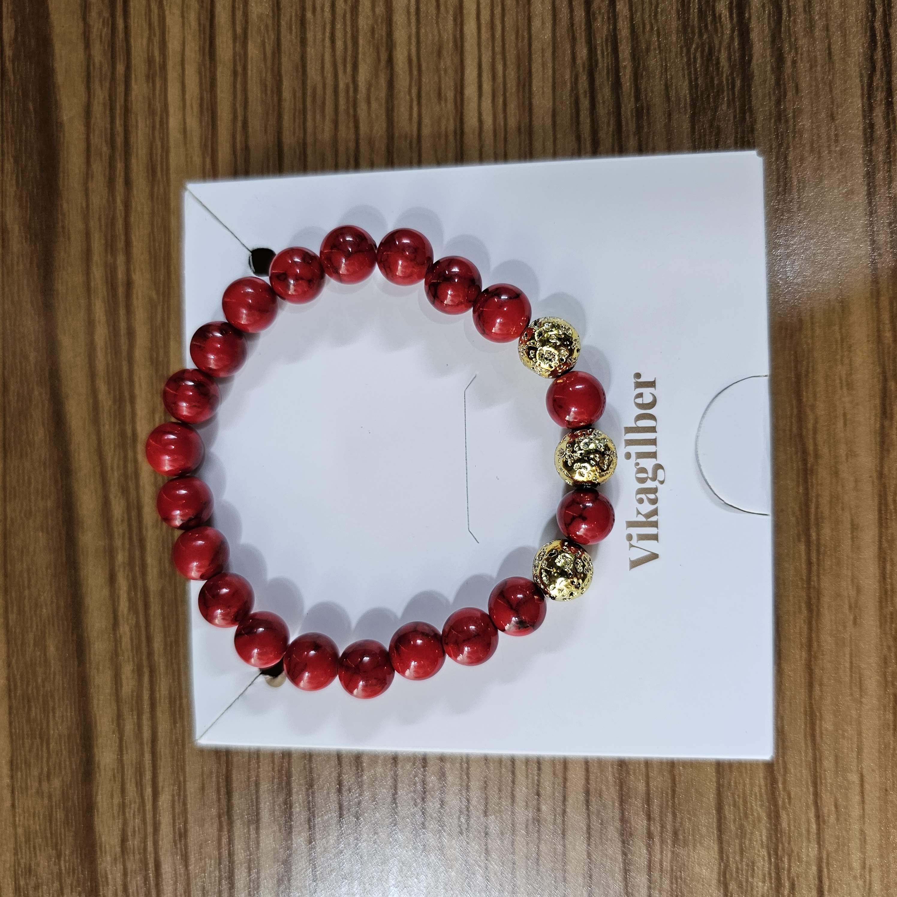 Pulsera Fósil Carmesí